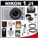 Nikon 1 J1 Digital Camera Body with 10-30mm VR Lens (Silver) with 32GB Card + Case + Tripod + Filter + Remote + Wide Angle & Telephoto Lens Kit