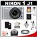 Nikon 1 J1 Digital Camera Body with 10-30mm VR Lens (Silver) with 32GB Card + Case + UV Filter + Tripod + Wireless Remote + Accessory Kit
