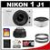 Nikon 1 J1 Digital Camera Body with 10mm f/2.8 & 10-30mm VR Lens (White) with 32GB Card + Case + (2) UV Filters + Accessory Kit